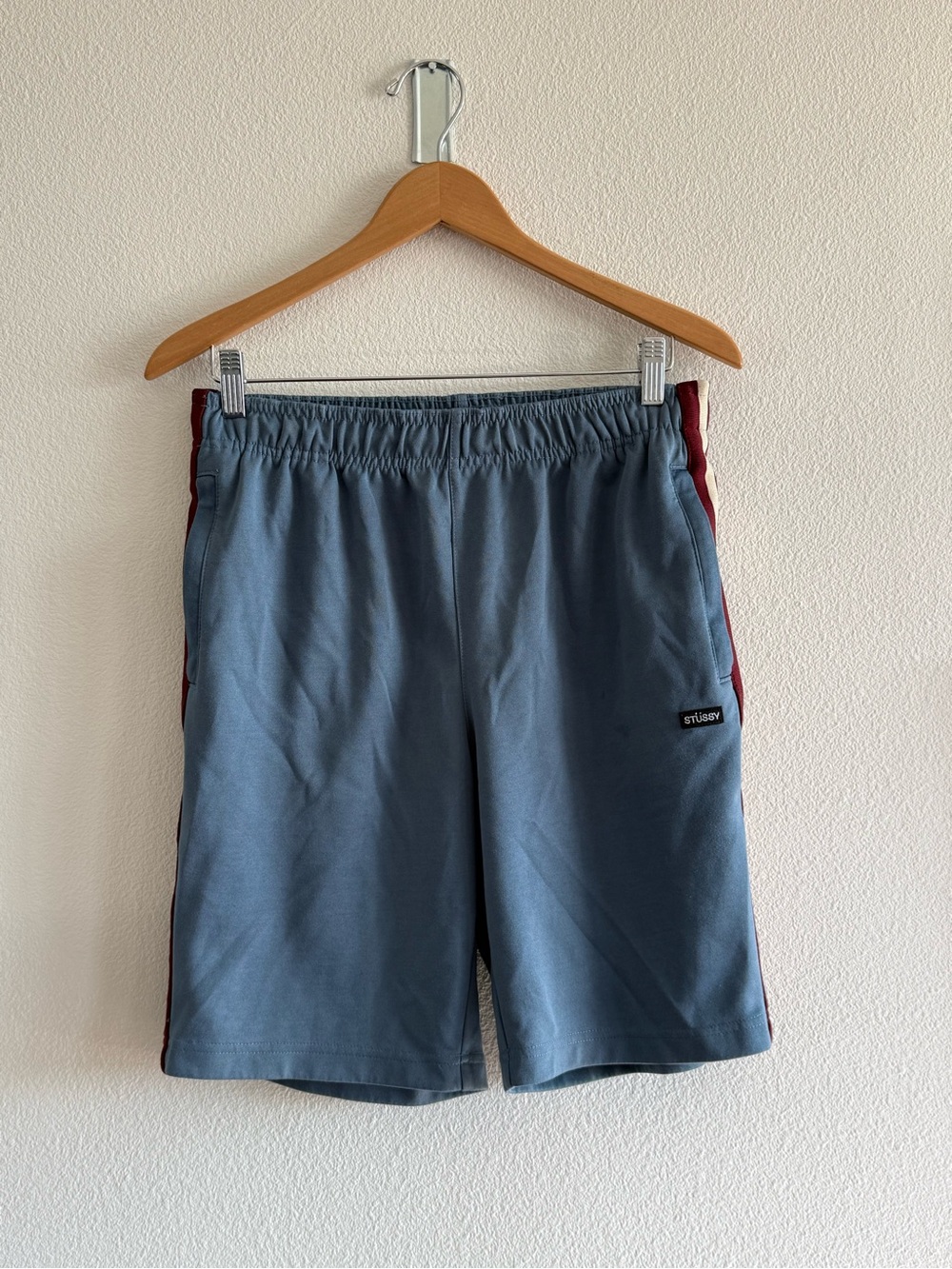 Stüssy blue shorts with red + white stripe size S